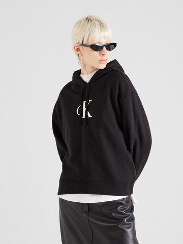 Sweat-shirt Calvin Klein Jeans en noir : devant