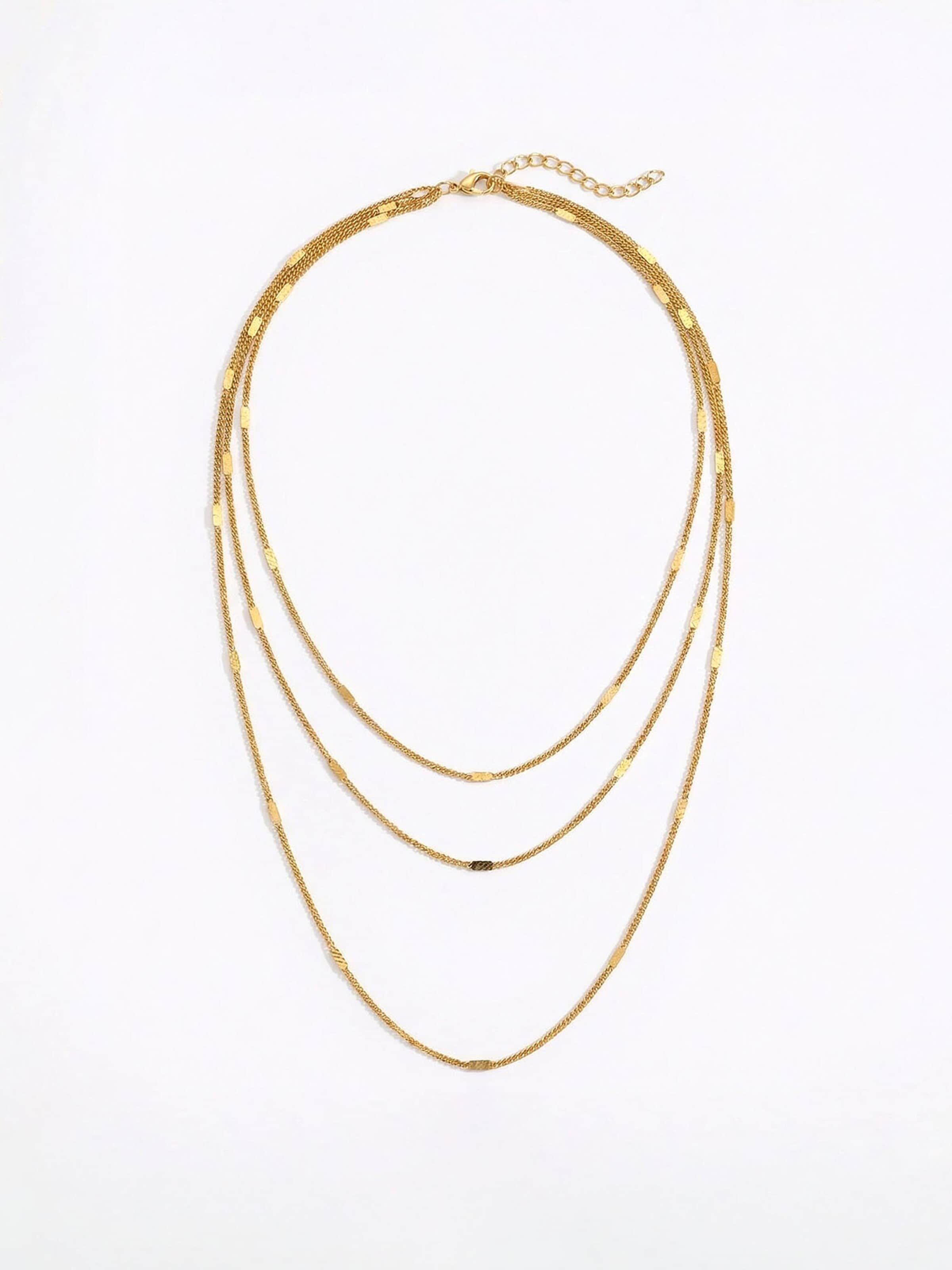 Nemomatheo Necklace 'Invisible Layers – Dreifache Feingliederkette' in Gold: front