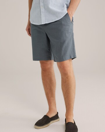 WE Fashion Loose fit Chino trousers in Green: front