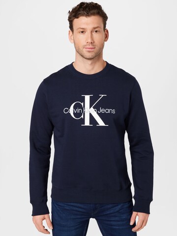 Sweat-shirt Calvin Klein Jeans en bleu : devant