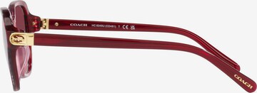 Lunettes de soleil COACH en rouge