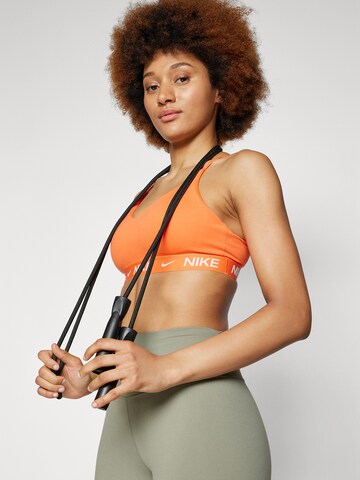 NIKE Μπουστάκι Αθλητικό σουτιέν 'INDY' σε πορτοκαλί