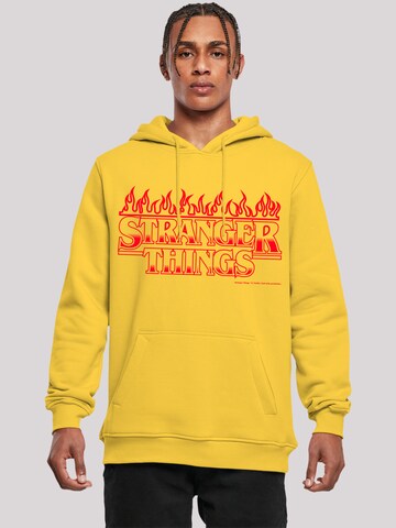 F4NT4STIC Sweatshirt 'Stranger Things Flames Netflix TV Series' in Gelb: predná strana