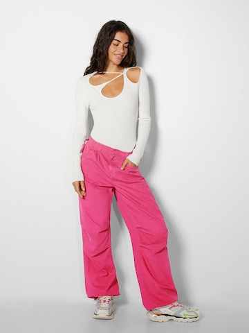 Bershka Wide leg Pleat-Front Pants in Pink