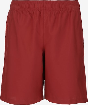 Regular Pantalon de sport UNDER ARMOUR en rouge : devant