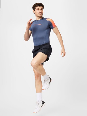 UNDER ARMOUR Regular Sportbroek 'Peak' in Zwart