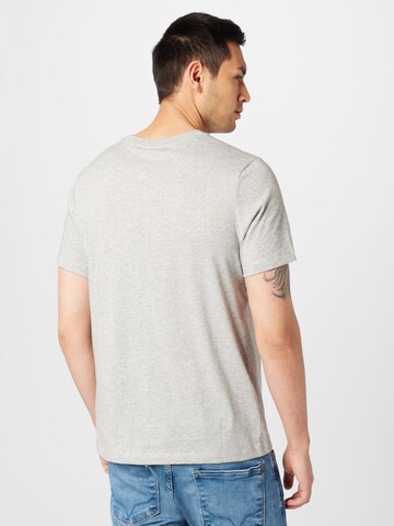 NIKE - Camiseta funcional en gris