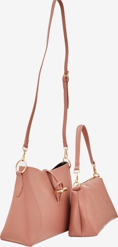 Sac bandoulière Usha en rose