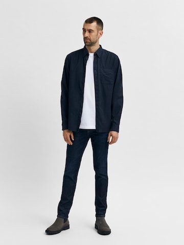 Coupe slim Jean 'Leon' SELECTED HOMME en bleu