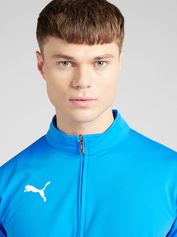 PUMA Тренировочный костюм 'Team Rise' в Синий