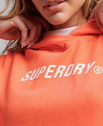 Superdry Bluzka sportowa w kolorze pomarańczowy