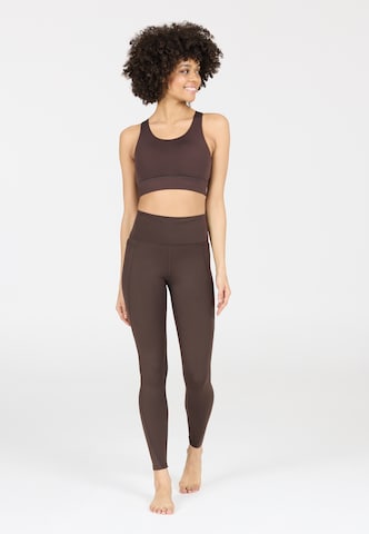 Athlecia Skinny Sports trousers 'Aliya' in Brown