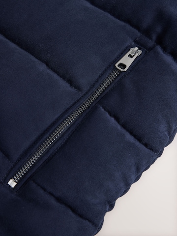 Next - Chaleco en azul