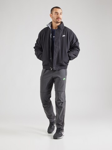 Nike Sportswear Tapered Trousers in Grey
