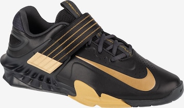 Chaussure de sport 'Nike Savaleos' NIKE en or : devant
