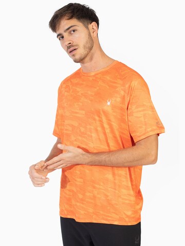 T-Shirt fonctionnel Spyder en orange : devant