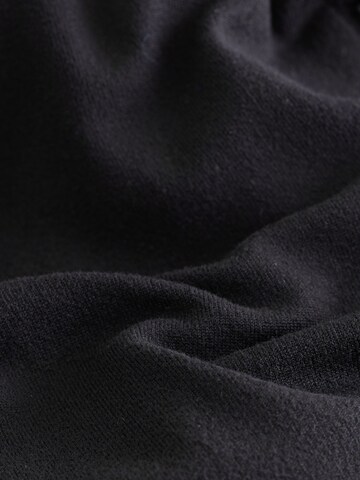 melns Next Standarta Bikses