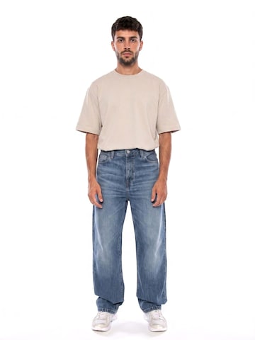 Carhartt WIP Baggy Jeans 'LANDON PANT BLUE MARBLE USED WASH' in Blue: front