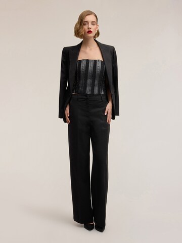 Top di MOTIVI in nero