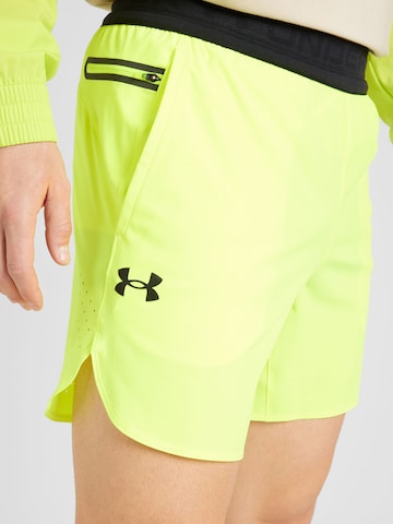 UNDER ARMOURregular Sportske hlače 'Peak' - žuta boja