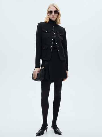 Fustă 'Grunge' de la MANGO pe negru