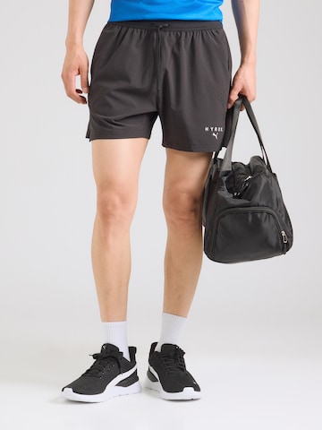 PUMA Regular Sportbroek 'PUMA x HYROX PWRMODE' in Zwart: voorkant