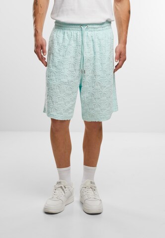 Loosefit Pantalon Karl Kani en vert