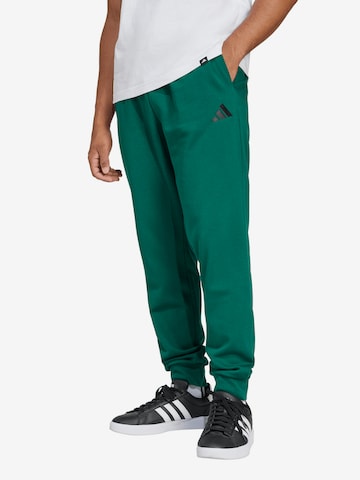 ADIDAS SPORTSWEARTapered Sportske hlače 'FEELCOZY' - zelena boja: prednji dio