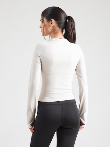 Tricou funcțional 'Sculpt' de la ICANIWILL pe alb