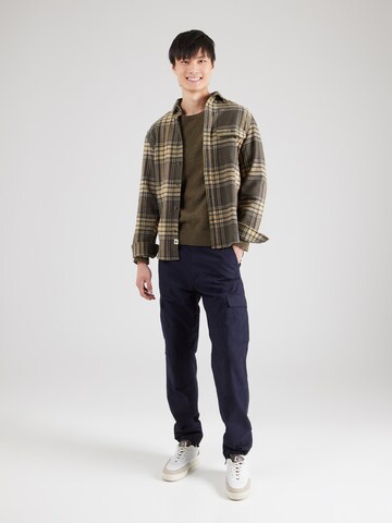 Carhartt WIP - Loosefit Pantalón cargo 'Aviation' en azul