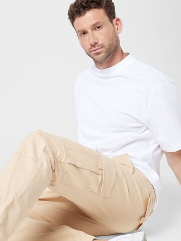 Tommy Jeans Tapered Cargo Pants 'ETHA' in Beige