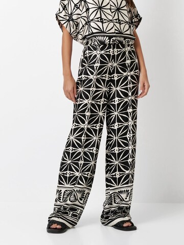 TONI Loose fit Pleat-Front Pants in Black: front