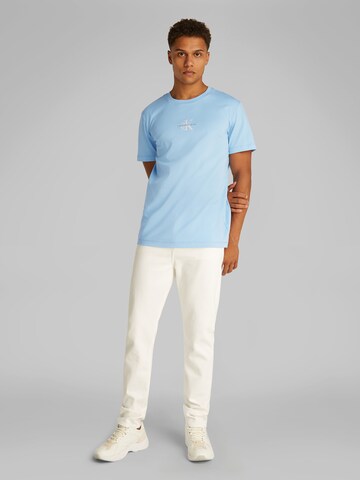 Regular T-Shirt Calvin Klein Jeans en bleu