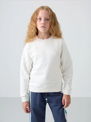 Tommy Life - Sweatshirt em castanho: frente