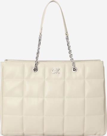 Calvin Klein Ostoskassi värissä beige