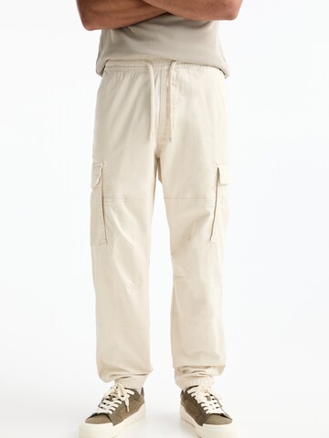 Effilé Pantalon cargo Pull&Bear en blanc : devant