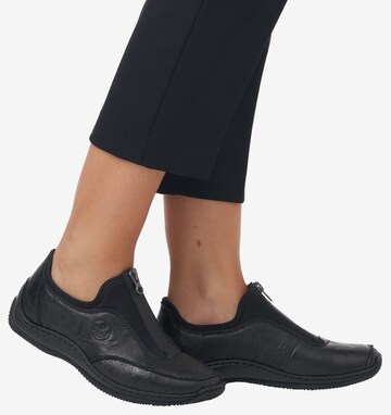 Rieker Slip-Ons in Black