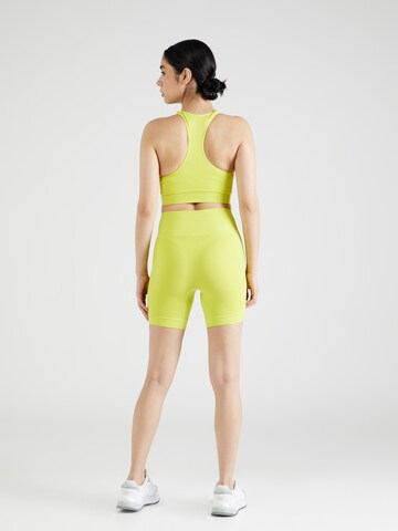 Skinny Pantaloni sport 'Tif' de la Hummel pe verde