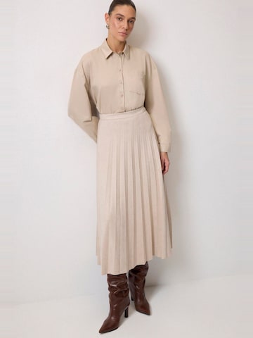 Touche Prive Rock in Beige
