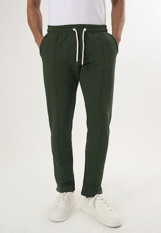 Felix Hardy Regular Trousers in Green: front