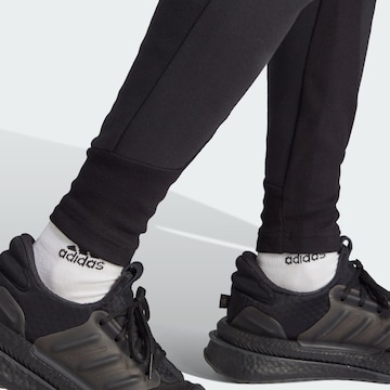 ADIDAS SPORTSWEAR Дънки Tapered Leg Спортен панталон 'Z.N.E. Premium' в черно