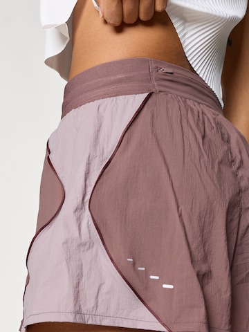 NIKE Regular Workout Pants 'Swift' in Pink