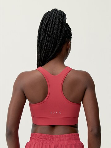 Born Living Yoga Sporttop 'Bikila' in Rot