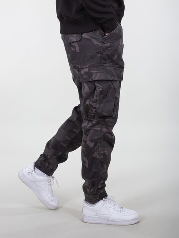 ALPHA INDUSTRIES Tapered Cargo Pants in Black