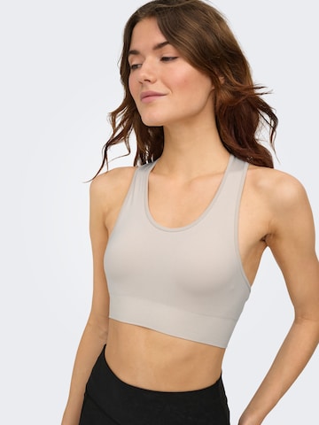 ONLY PLAY Обычный Спортивный бюстгальтер 'ONPDAISY' в Серый: спереди