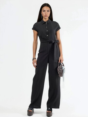 Busem Jumpsuit in Black: front
