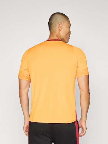 Maillot 'GSK' PUMA en orange