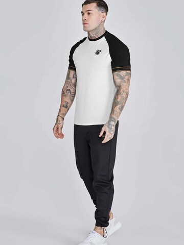 SikSilk - Camiseta 'Tech' en blanco: frente