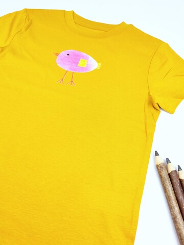 MelaDi Shirt 'Lila Vogel'‌‌‌‌‌‌‌‌‌‌ in Gelb