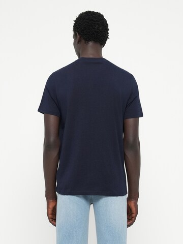 GUESS Bluser & t-shirts i blå